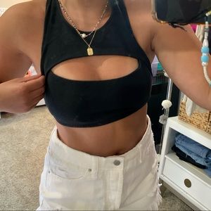 Out from under bra top!